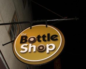 bottle shop hanging sign